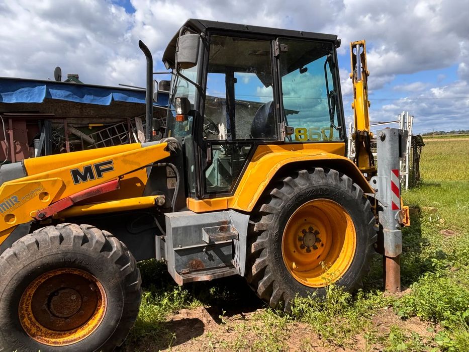 Fermec 50HX  MF Fermec 860 1995 rok