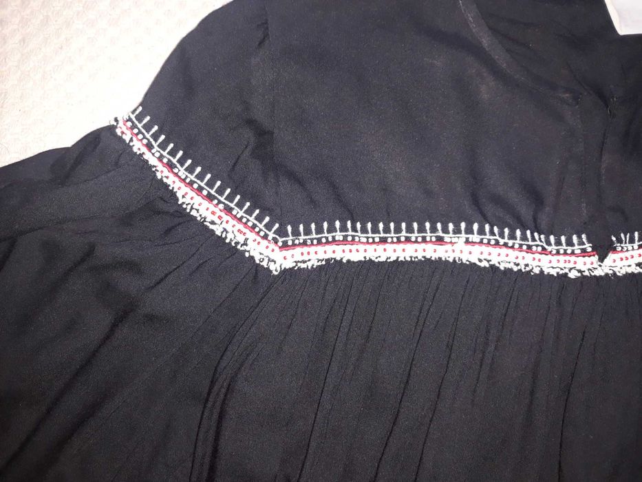 Camisa preta com missangas