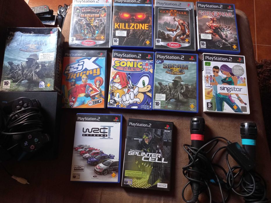 Consola playstation 2 com vários acessórios e jogos