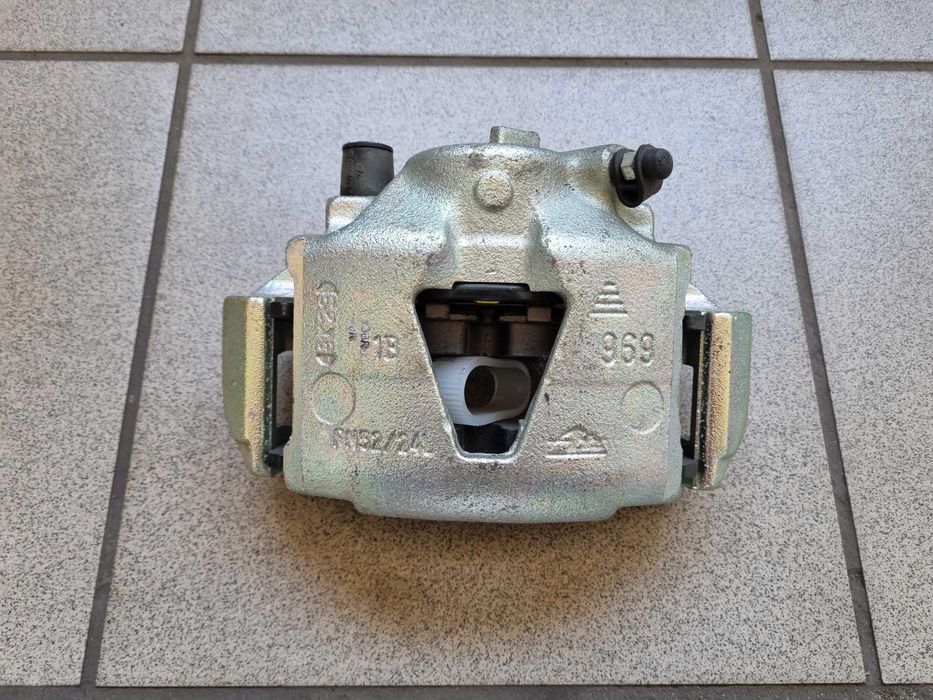 Lewy Zacisk hamulcowy Daewoo Espero Nexia 14 koła Opel Omega .