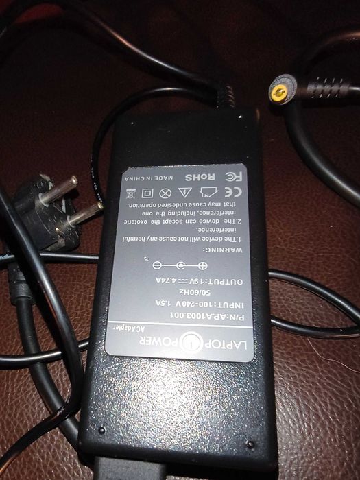 Ładowarka  Rower El.. 54,5 V A i zasilacze HP i zasilacz marki Laptop Power.