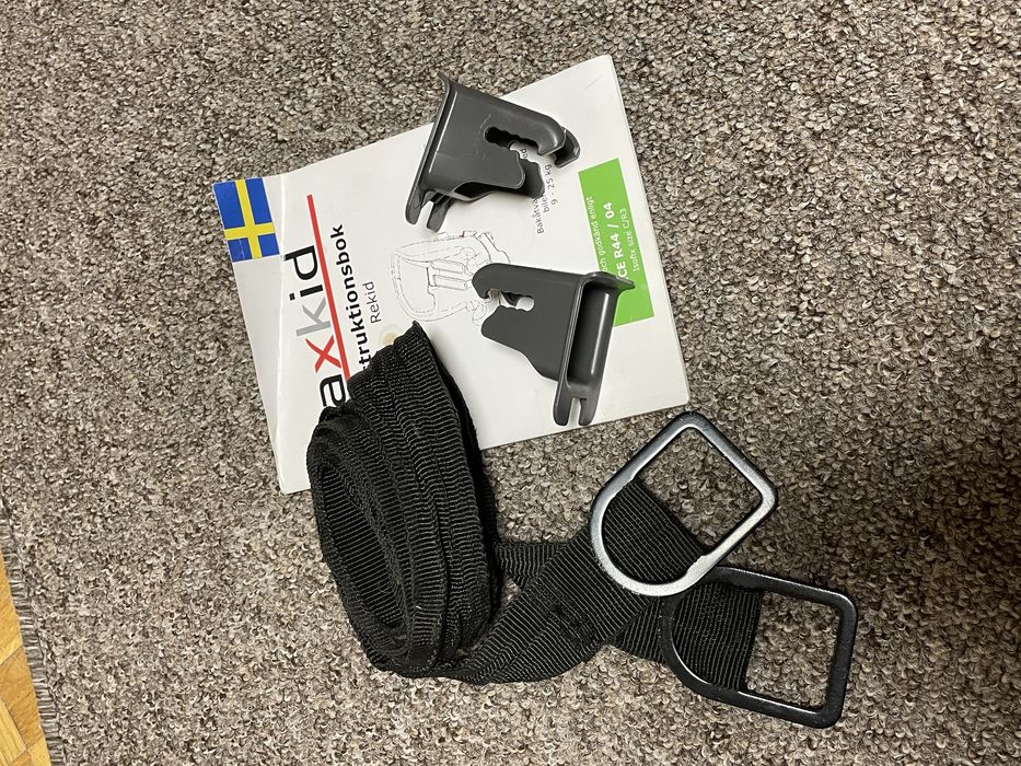 Fotelik AXKID Rekid RWF 9-25 tyłem do kierunku jazdy ISOFIX