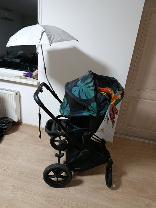 дитяча коляска Cybex Priam з колекції Birds of Paradise.
