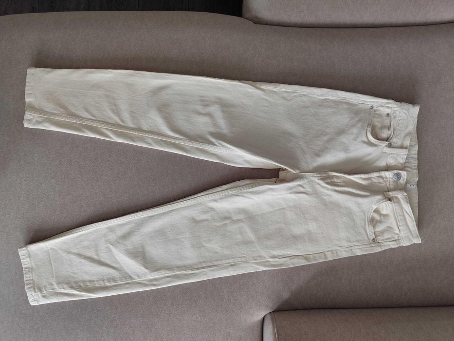 Spodnie jasno kremowe 36