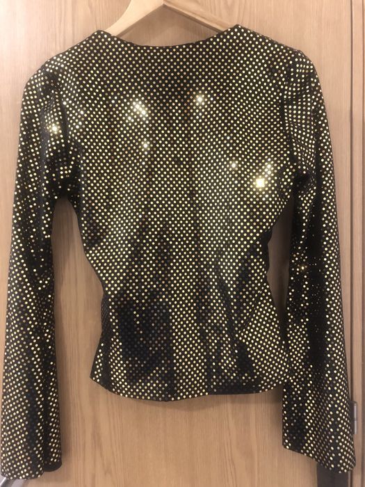 Blusa dourada de brilho