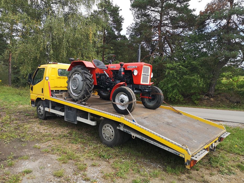 Transport Maszyn budowlanych Laweta Kraków i okolice