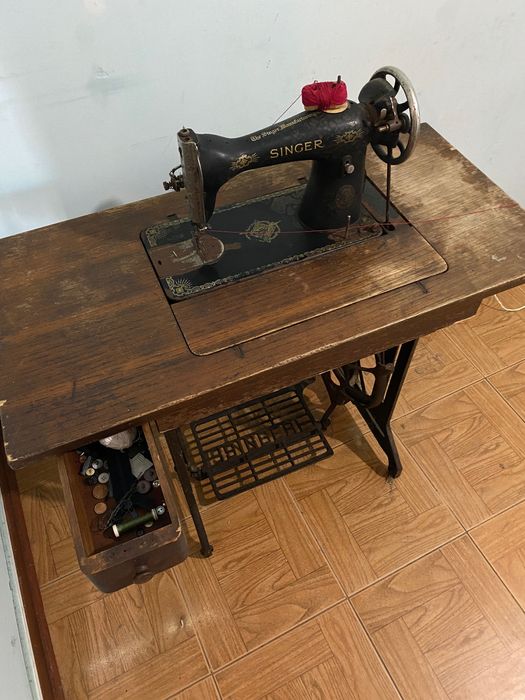 Máquina de pé Singer