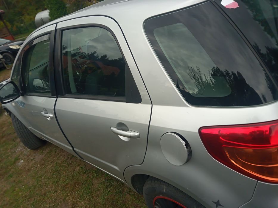 Suzuki SX4 1.6 b silnik skrzynia drzwi