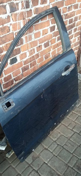 Двері Шевроле каптіва с100