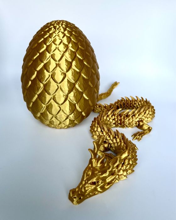 золотий рухливий дракон у яйці з реалістичними очима 3д іграшка