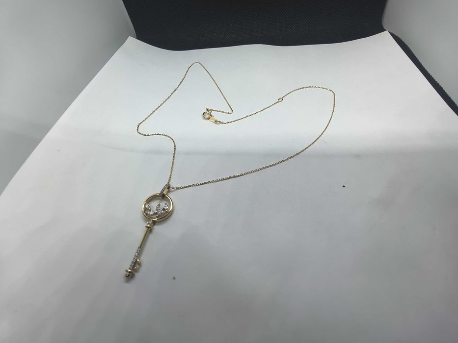 Zawieszka z brylantami na łańcuszku 0.20ct certyfikat