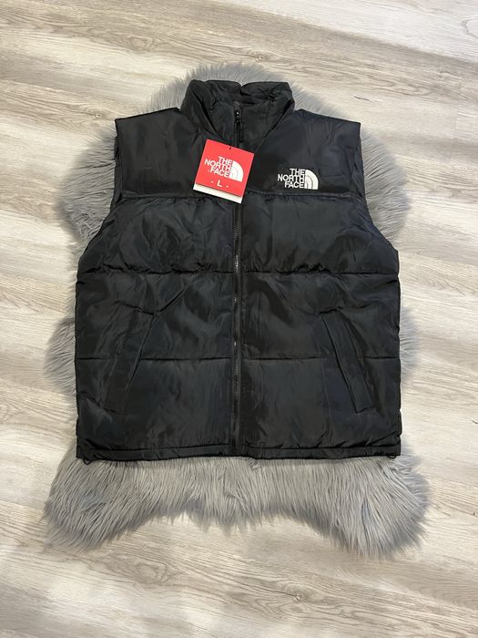 жилетка the north face