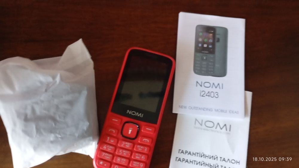 Кнопочний телефон з гарантия  присутня новий тока з магазина
