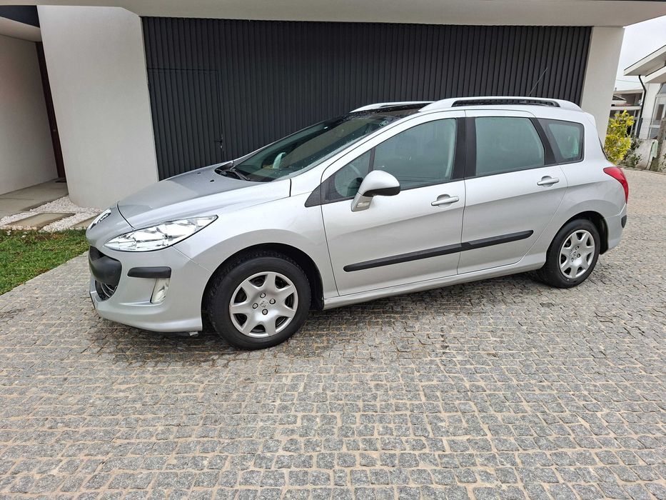 Peugeot 308 SW 7 lugares teto panorámico