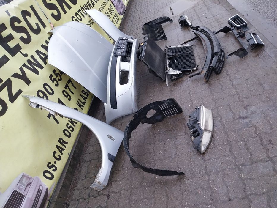 Mitsubishi Carisma zderzak  lampa chłodnice belka pas kpl