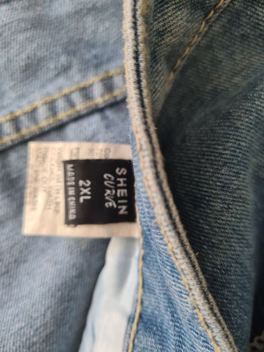 Szerokie szorty modne frędzle spodenki jeansowe 2xl