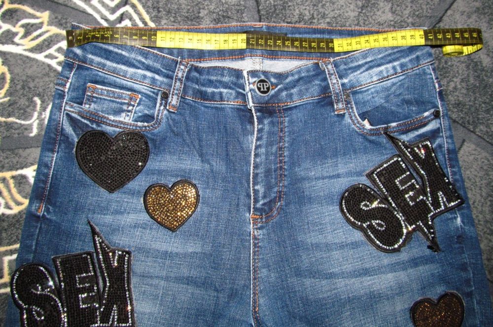 Темно-сині джинси