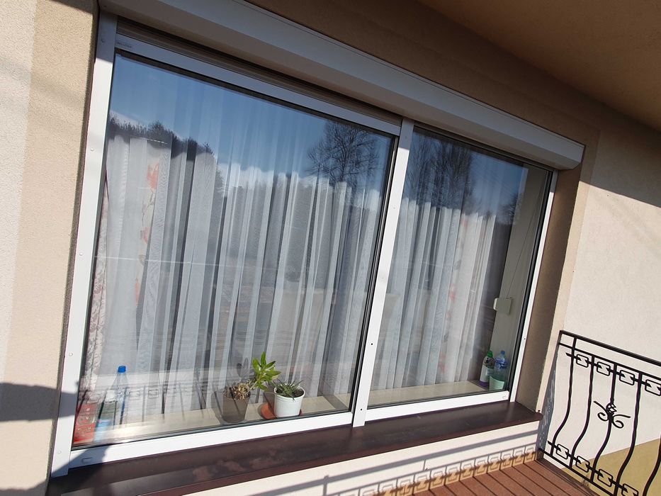 Okna drzwi balkonowe PCV białe 18szt  profil Rehau 2 szyby + rolety