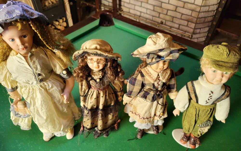 Lalki porcelanowe 4 szt.