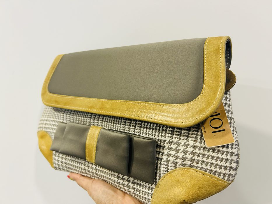 Pochete NOVA da marca ÉMOI. Em tecido com apontamentos em pele