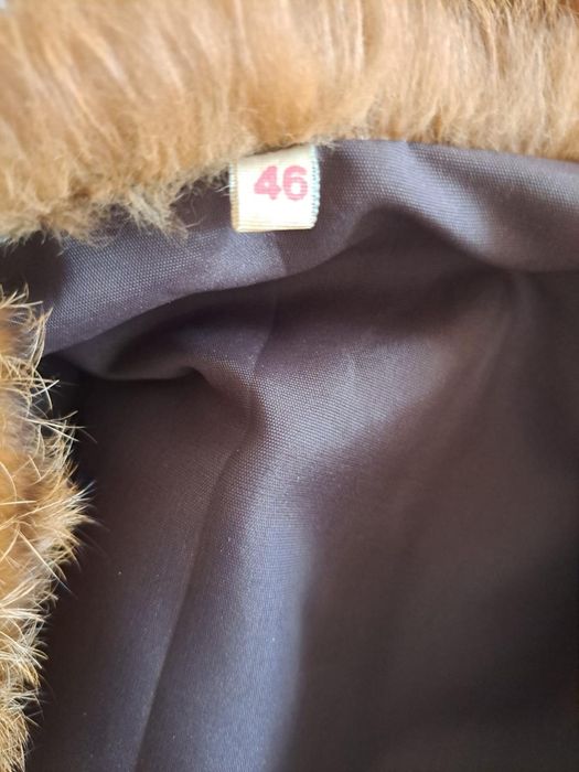 Casaco de pêlo castanho