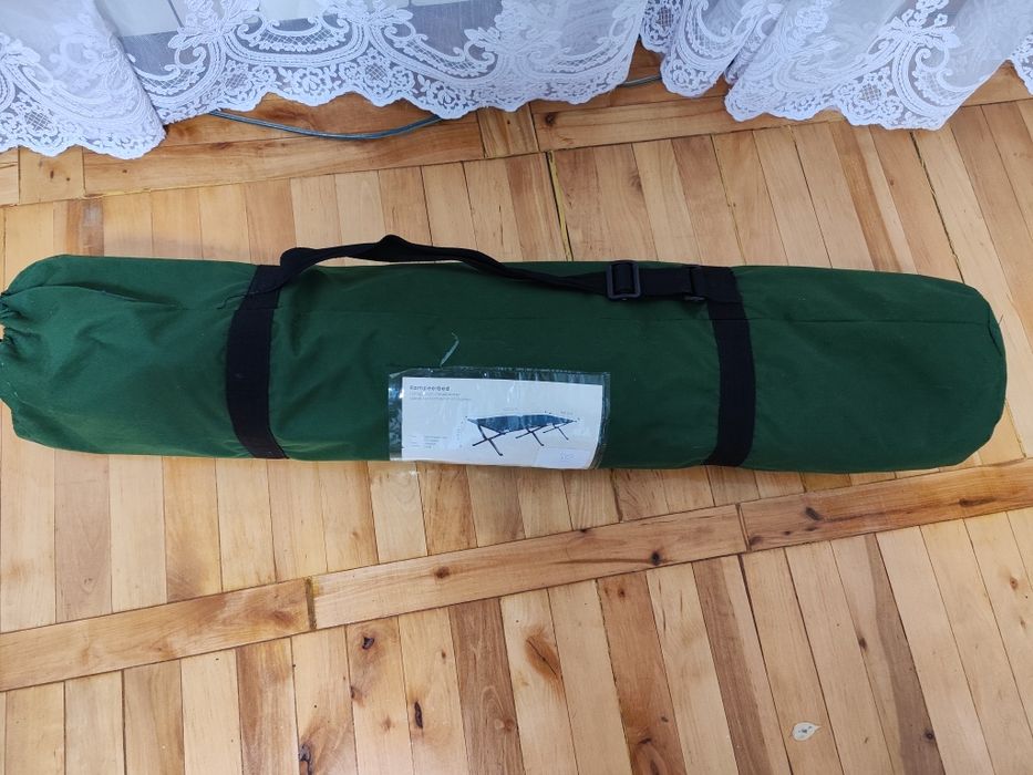 Розкладушка в футлярі зелена