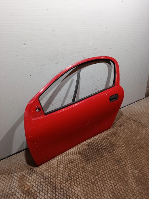 Porta frente esquerda OPEL Tigra (75_)