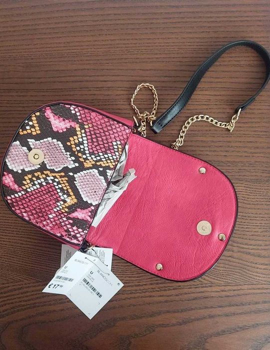 Carteira por estrear (ainda com etiqueta)