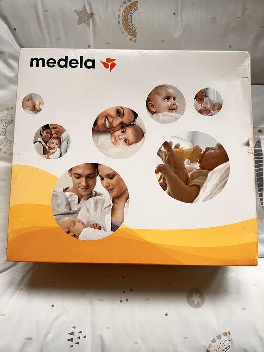 Молоковідсмоктувач автоматичний Medela+ пляшки