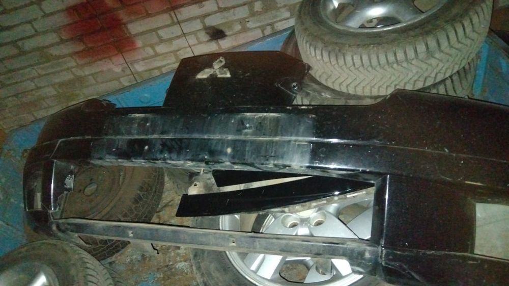 Бампер Mitsubishi Outlander 1