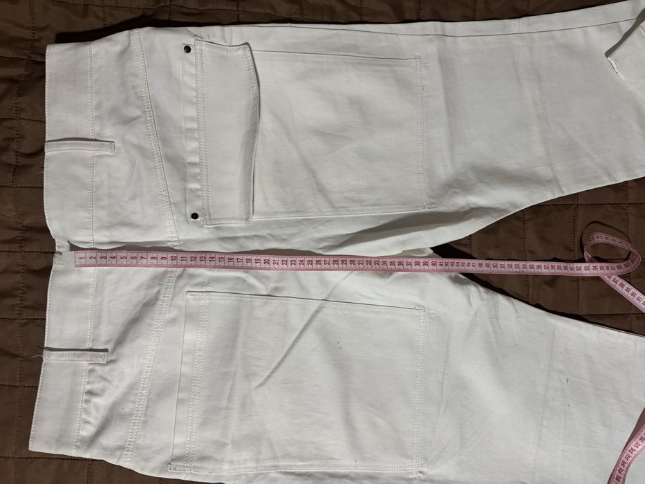 Бавовняні штани від бренду Mango