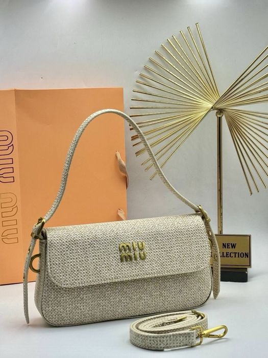 Нові сумки Gucci та miu miu.