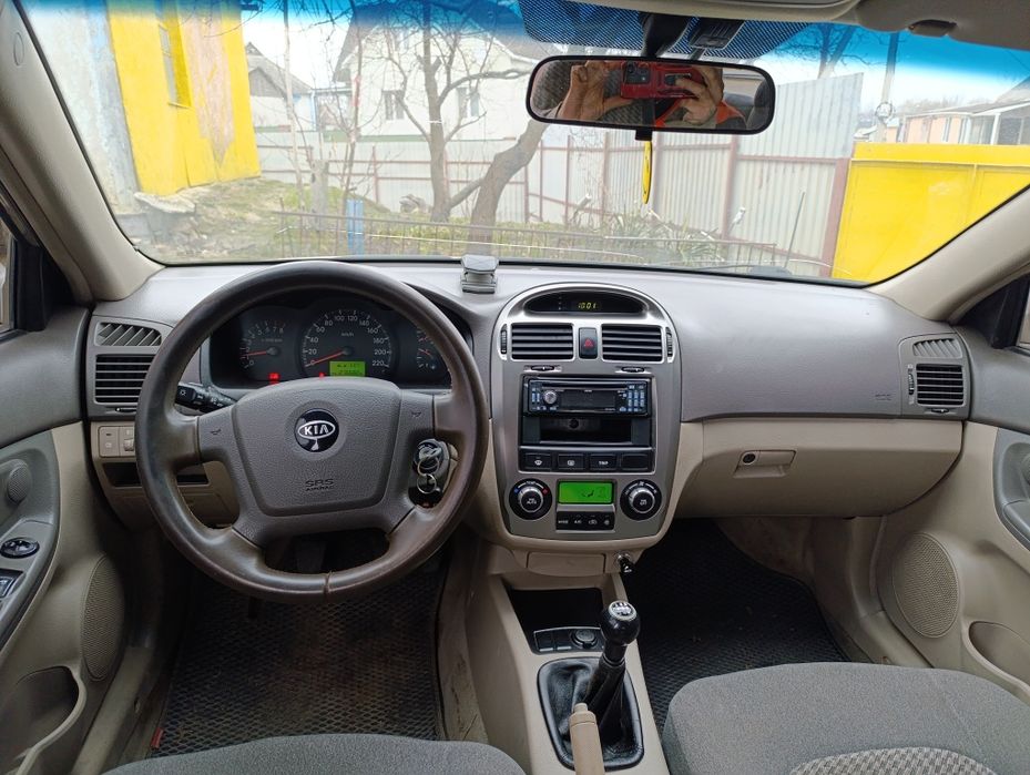 KIA Cerato 2.0 газ-бензин на кліматі