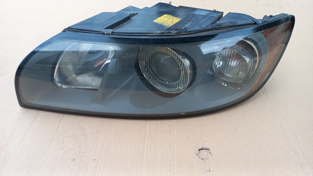 Volvo v50 s40 reflektor lampa lewa lewy przód eu 04-