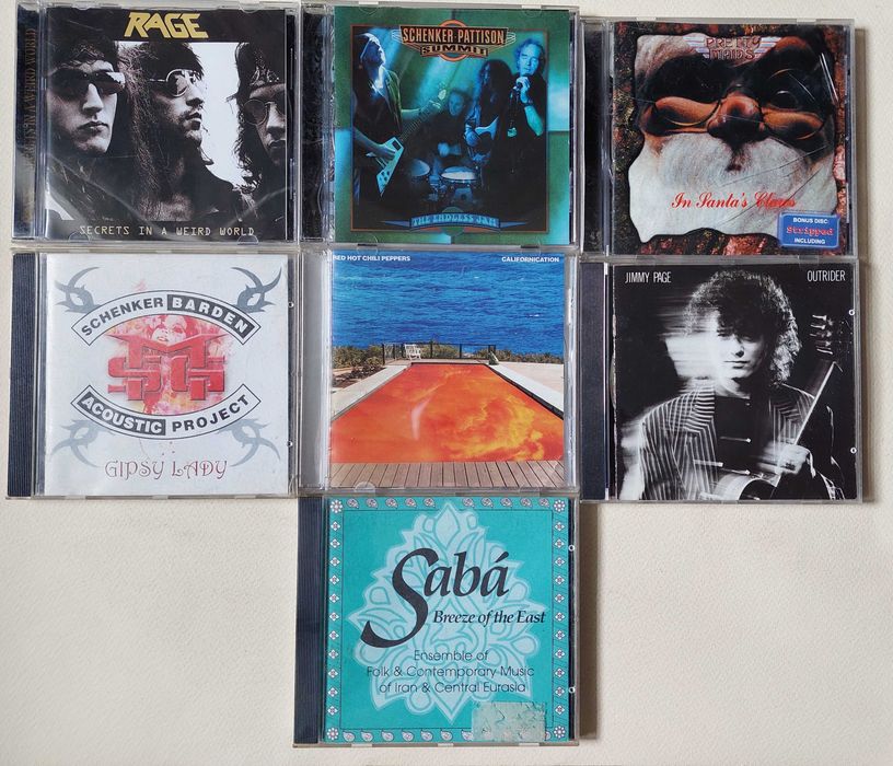 Диски CD. Rammstein. Queen. Rainbow. Rhapsody. Robert Plant. Saxon...