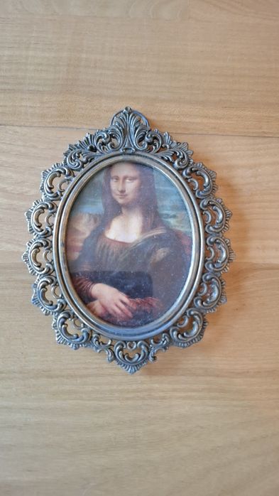 Portrety w ramkach z mosiądzu