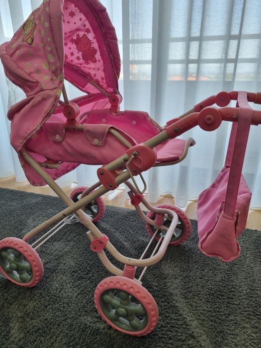 Conjunto  carrinho cama alcofa e saco hello kitty  como novo
