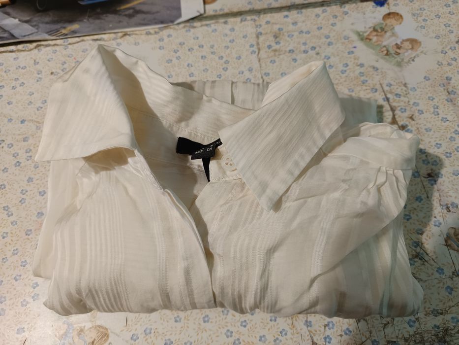 Vendo a camisola branca para mulher bom estado