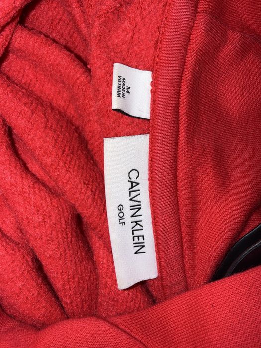 Czerwona bluza z kapturem calvin klein golf all over print hoodie