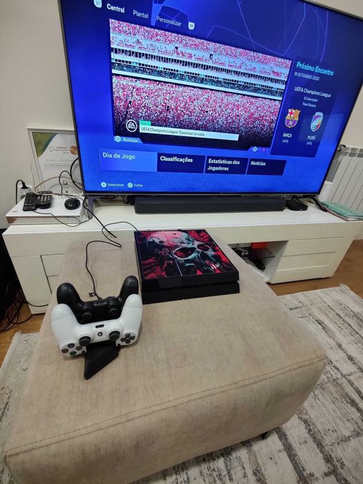 Playstation 4, 2 comandos wireless, 7 jogos e estação de carregamento