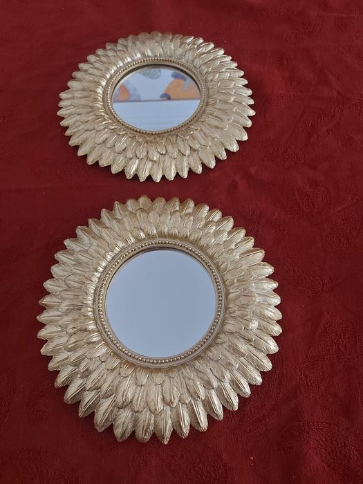 Dois espelhos dourados da Sfera