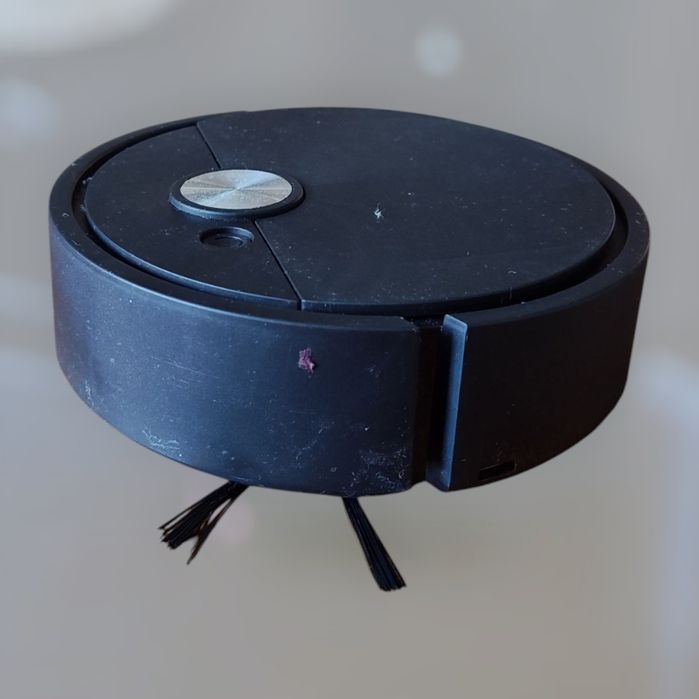 Odkurzacz automatyczny, robot jeżdżący, bezprzewodowy.