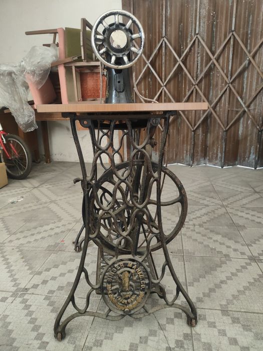 Máquina de costura singer