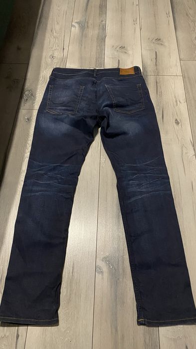 Spodnie Jack&Jones 34/34 Slim Straight/ TIM granatowe jeansy męskie