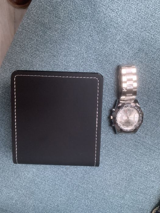 Zegarek męski z branzoletà .