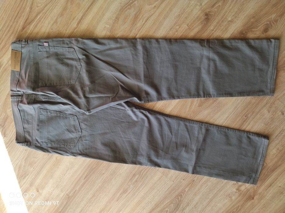 Spodnie jeans męskie L