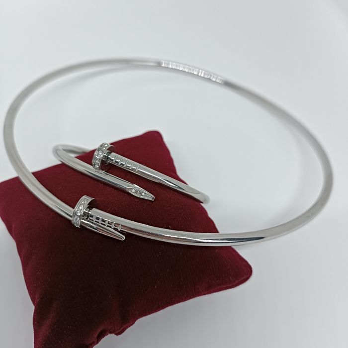 Набір прикрас жіночий: жорсткий чокер і браслет цвях  з цирконіями