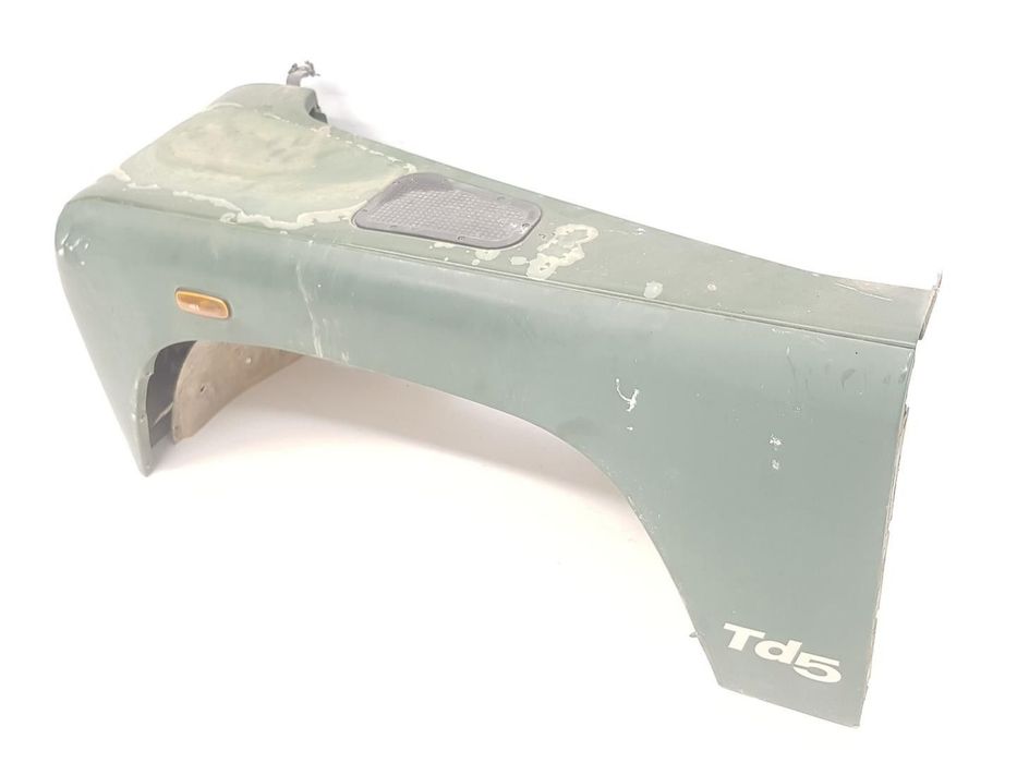 GUARDA-LAMAS FRONTAL ESQUERDO LAND ROVER DEFENDER STATION WAGON 1999 -