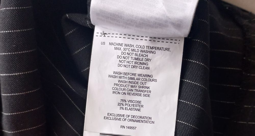 Spodnie bootcut z rozciętymi na dole nogawkami, 75% wiskozy