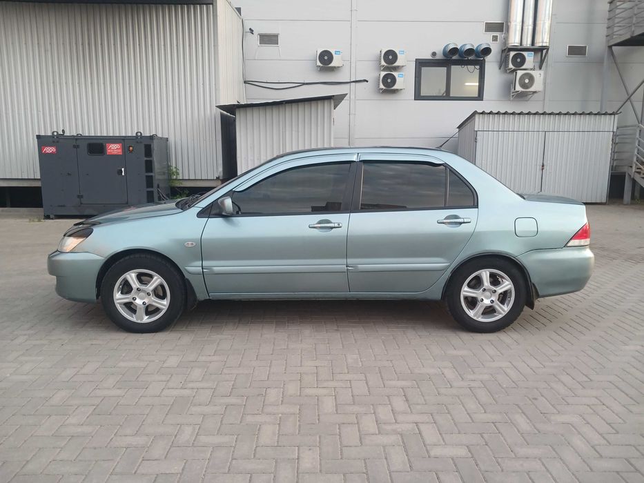 Продам Mitsubishi Lancer.
